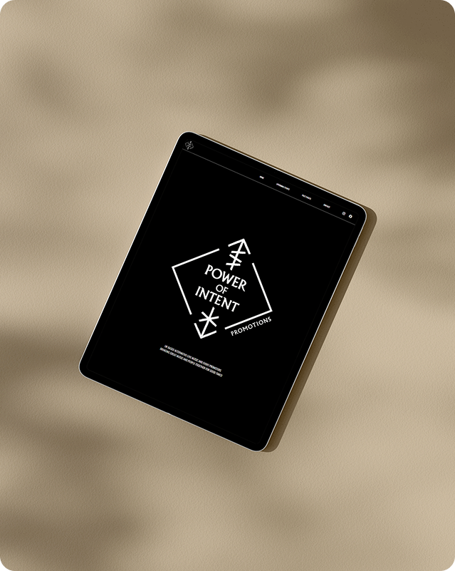 Tablet mockup displaying the Power of Intent Promotions website homepage on a black background